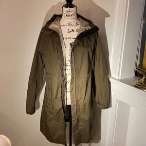 Small green raincoat